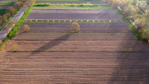 High angle view of wooden fence on field