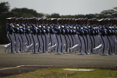 The indonesian air force army defiles in a rehearsal to celebrate the birthday of the air force.