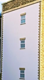 The white wall and two windows