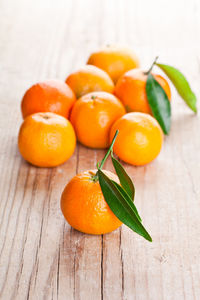 Close-up of oranges on table