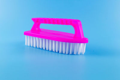 High angle view of toy on table against blue background