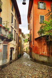 Narrow alley with buildings in background