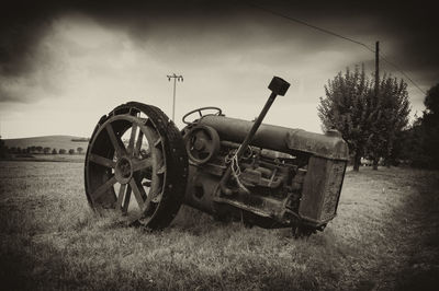 Abandoned cart in field