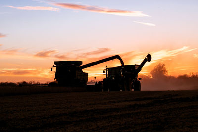 Scenic view of landscape against sky during sunset