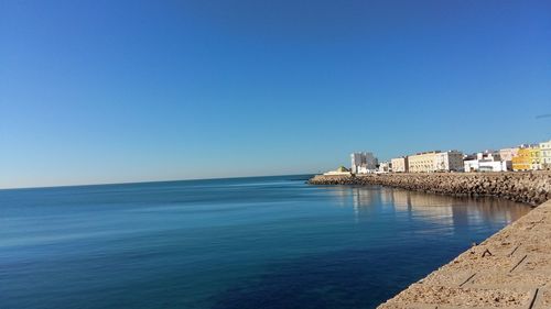 View of sea against blue sky