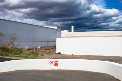 High angle view of road against cloudy sky