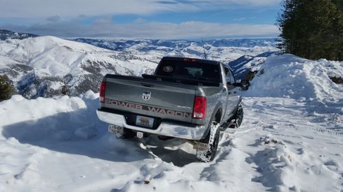 Snow covered car on mountain