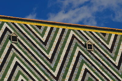 Low angle view of built structure against blue sky