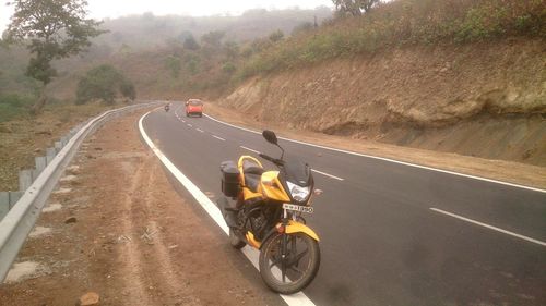 Man cycling on road