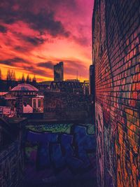 View of cityscape against sky during sunset