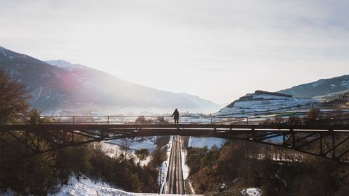Bridge over river against sky