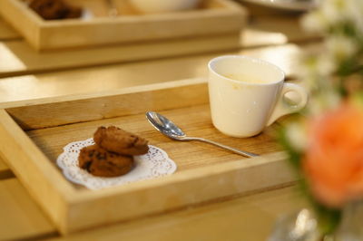 Close-up of cup and coffee on table