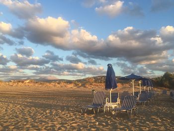 Man standing on sand against sky