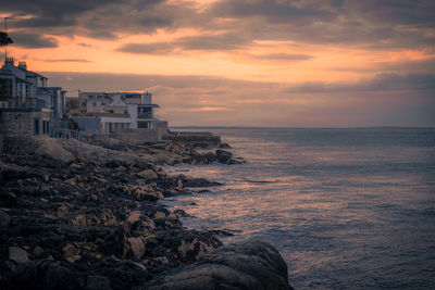 Scenic view of sea against sky during sunset