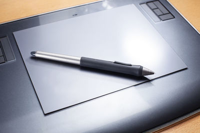 High angle view of pen on table