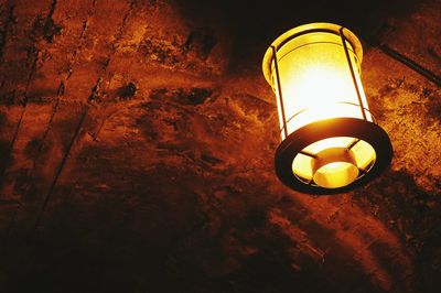 Low angle view of illuminated light bulb