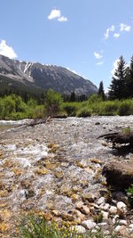 Scenic view of river and mountains