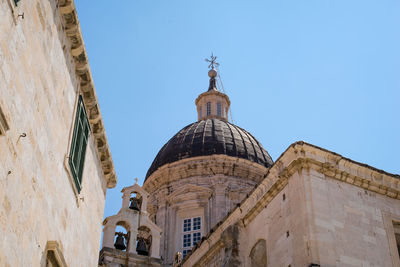 Low angle view of historic building against sky