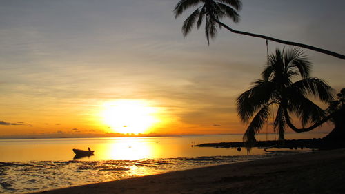 Scenic view of sunset over sea