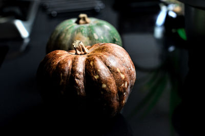 Close-up of pumpkins on table