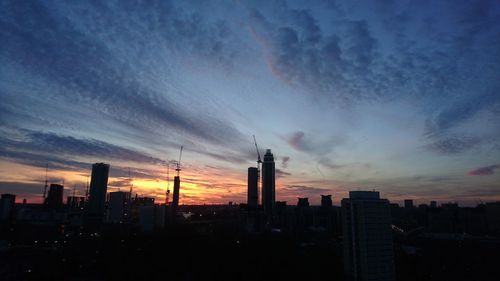 City skyline against sky during sunset