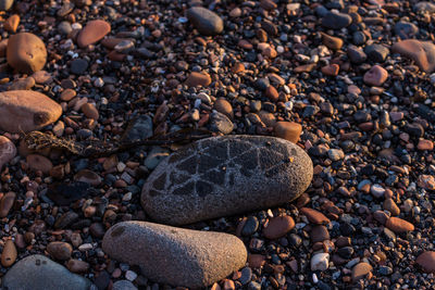 Close-up of pebbles on beach