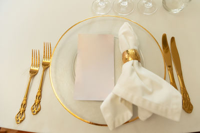 High angle view of wedding rings on table