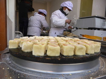 People working in tray