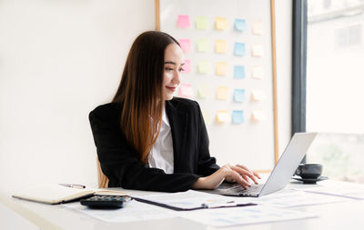 Businesswoman working at office