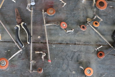 High angle view of various objects on metal