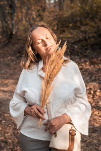 Woman holding a mask