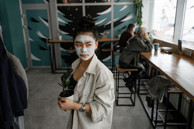 Portrait of two people in restaurant