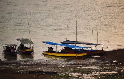 Fishing boats sailing in sea