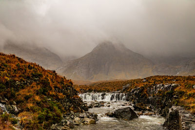 The isle of skye fairy pools on a wet misty day