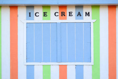 Ice cream text on multi colored wall