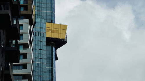 Low angle view of modern building against sky