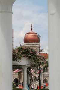 Temple against sky in city