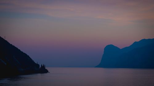 Scenic view of sea against sky at sunset