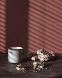 Close-up of coffee cup on table