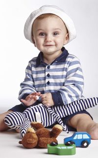 Portrait of a smiling boy holding toy