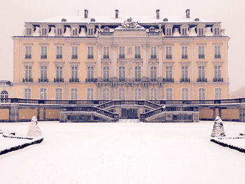 View of frozen building in winter