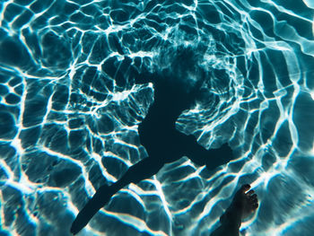 Full frame shot of swimming pool and human shadow