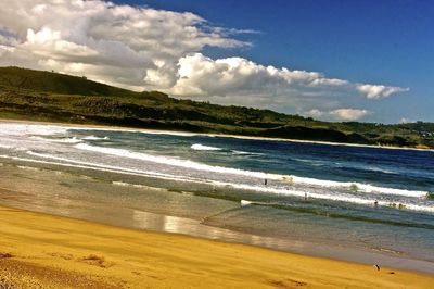 Scenic view of beach and sea against sky