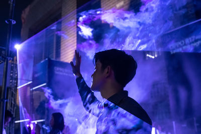 Portrait of man in aquarium