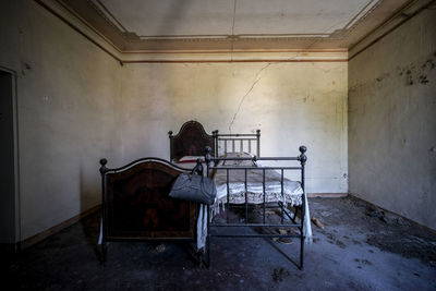 Empty beds in abandoned room