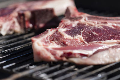 Close-up of meat on barbecue grill