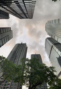 Low angle view of modern buildings against sky