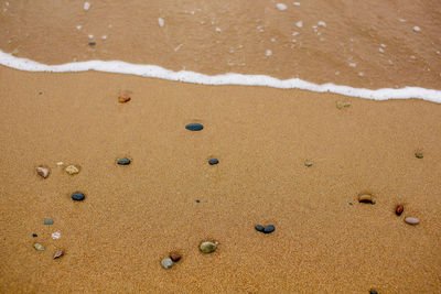 Close-up of sand at beach 