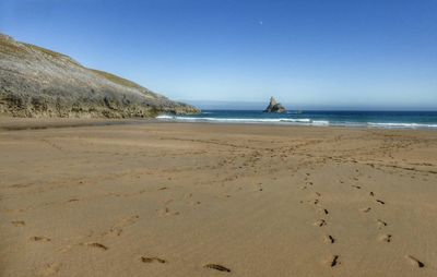 Scenic view of sea against clear sky