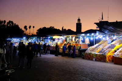 People on street at night